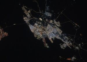 Archive NASA photograph of Dammam, Saudi Arabia, from the International Space Station, May 22, 2025; not the October 2026 missile incident.
