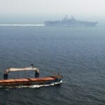 Merchant ship in the Strait of Hormuz, 2004, US Navy public domain