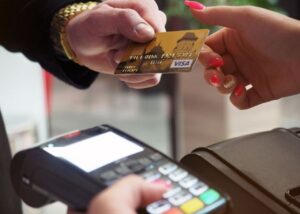 Archive photo of a card payment at a retail terminal, not identified as Adyen equipment