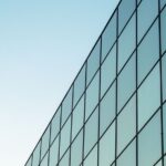 Archive photo of glass office facade, not identified as a JLL property