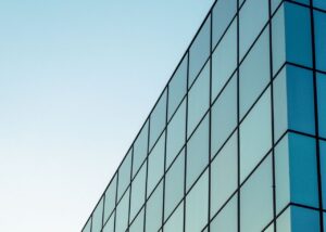 Archive photo of glass office facade, not identified as a JLL property