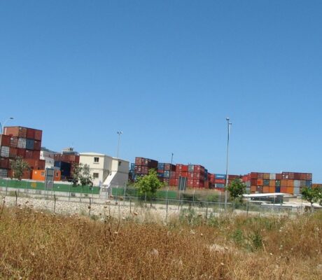 Archive containers at Haifa port, May 2011. Hanay, CC BY-SA 3.0 (cropped; image adaptation under the same license).