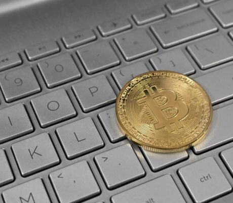 Archive photo: a physical bitcoin token rests on a laptop keyboard