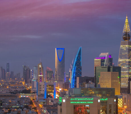 Archive photo: the Riyadh skyline at dusk, with the Kingdom Centre tower illuminated