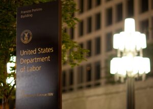 U.S. Department of Labor sign at the Frances Perkins Building. File photograph by Shawn T. Moore / U.S. Department of Labor; cropped.