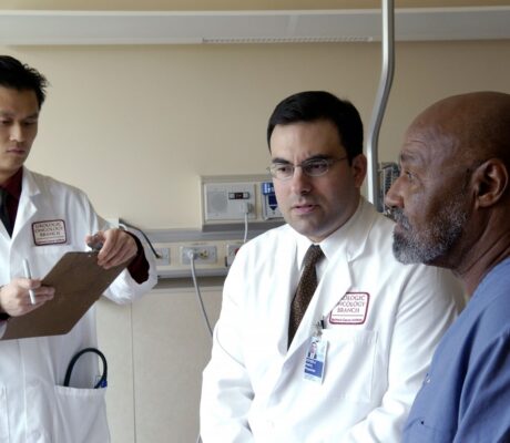 Doctors consult with a patient in a National Cancer Institute archive photograph from 2005. Illustrative image, not an assessment of the people pictured.