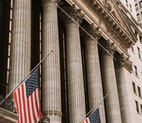 TheNewYorkStockExchange colonnade andAmericanflags in an illustrative archive photograph,notFridaytrading.