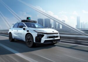 Toyota-supplied promotional image of a bZ4X fitted with Waymo autonomous-driving hardware.