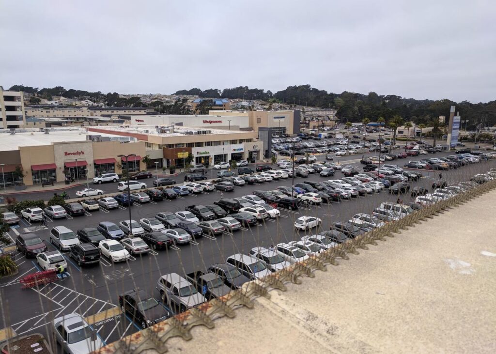 Archive photograph of Westlake Shopping Center in Daly City, California, in July 2018; not a photograph of the quarter's property acquisitions or current occupancy.